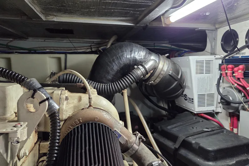 Pier Pressure Yacht Photos Pics Engine room of 2000 Carver 450 Voyager Pilothouse with visible components and wiring.