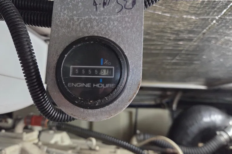 Pier Pressure Yacht Photos Pics Engine hour meter showing 5555.5 hours on a 2000 Carver 450 Voyager Pilothouse.