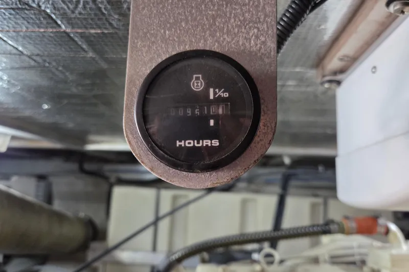 Pier Pressure Yacht Photos Pics Hour meter in 2000 Carver 450 Voyager Pilothouse engine room.