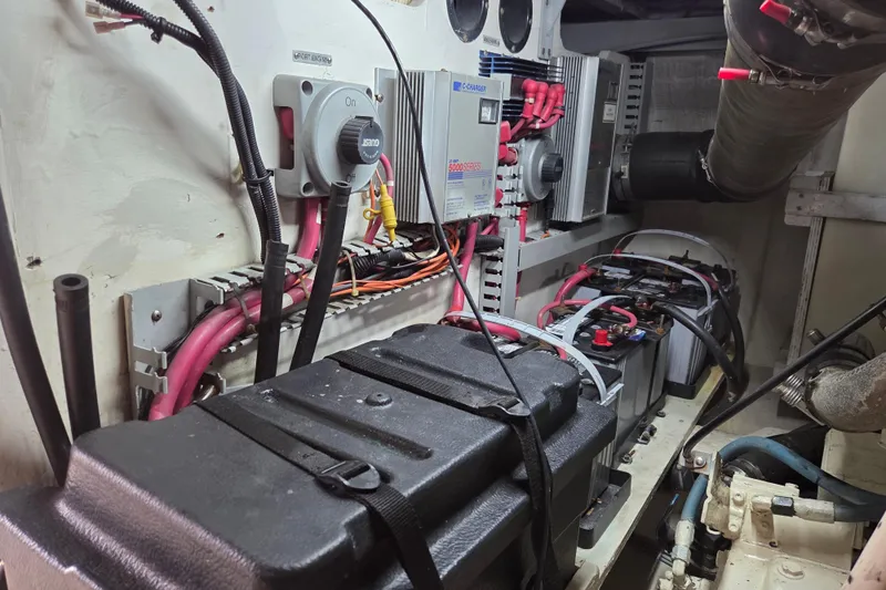 Pier Pressure Yacht Photos Pics Engine room of 2000 Carver 450 Voyager Pilothouse with electrical components and wiring.