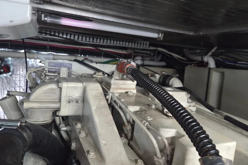 Pier Pressure Yacht Photos Pics Engine room of 2000 Carver 450 Voyager Pilothouse with visible components and wiring.