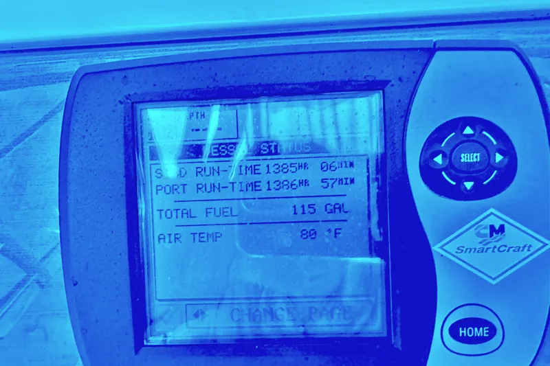 Current Affair Yacht Photos Pics Display screen of a 2005 Sea Ray 500 Sedan Bridge, showing engine data and fuel levels.