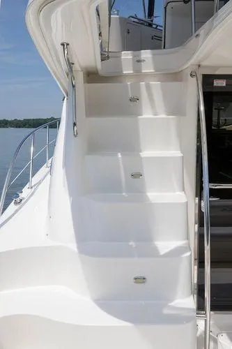 Current Affair Yacht Photos Pics Staircase on 2005 Sea Ray 500 Sedan Bridge yacht, leading to upper deck.