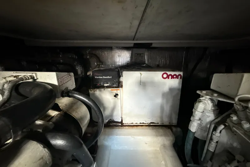  Yacht Photos Pics Engine room of 2003 Riviera 37 Flybridge with Onan Marine GenSet.