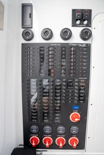  Yacht Photos Pics Electrical control panel on a 2021 Freeman 47 boat, featuring switches and dials.