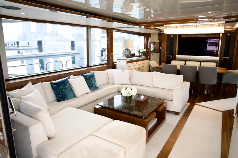  Yacht Photos Pics Luxurious interior of 2018 Sunseeker 95 Yacht with elegant seating and dining area.