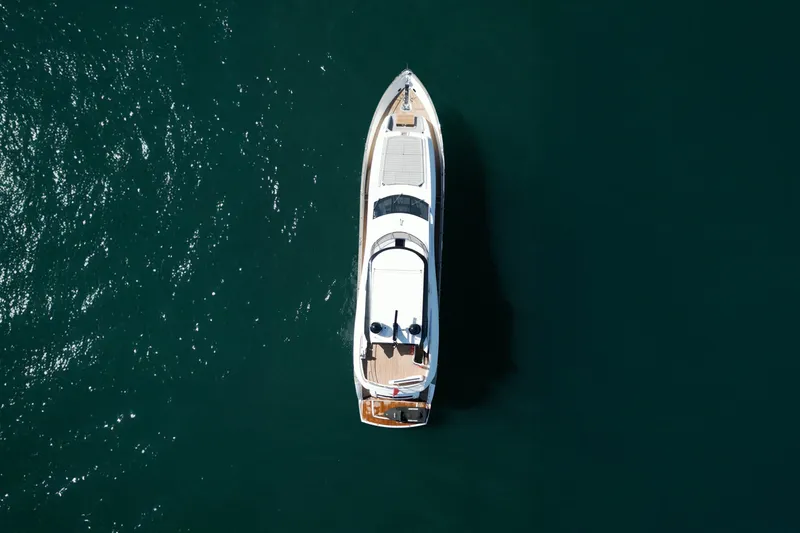  Yacht Photos Pics Overhead view of 2018 Sunseeker 95 Yacht on open water.