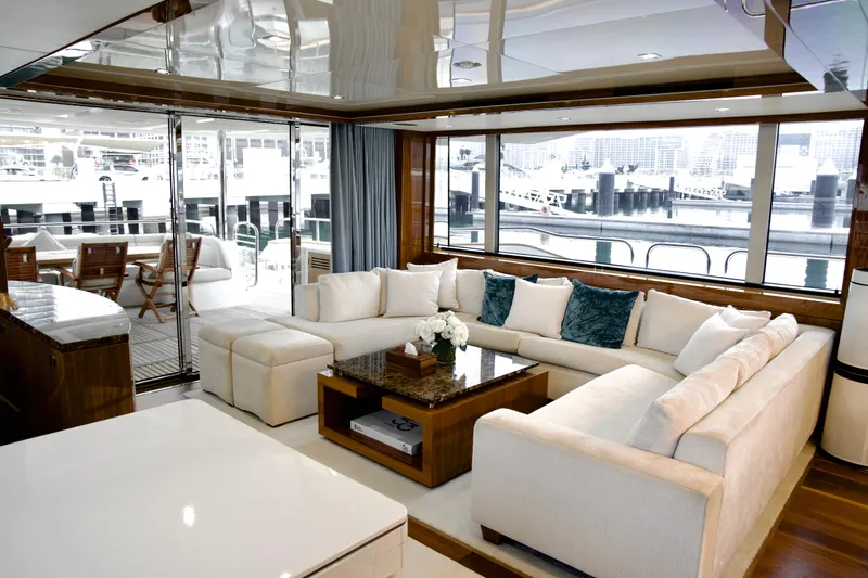  Yacht Photos Pics Luxurious interior of 2018 Sunseeker 95 Yacht with elegant seating and marina view.