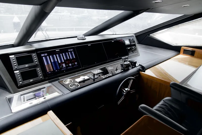  Yacht Photos Pics 2018 Sunseeker 95 Yacht helm with advanced navigation controls and sleek design.