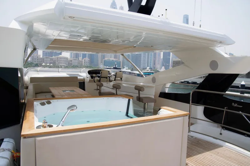  Yacht Photos Pics Luxurious 2018 Sunseeker 95 Yacht with jacuzzi and city skyline view.