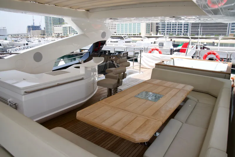  Yacht Photos Pics Luxurious Sunseeker 95 Yacht 2018 with elegant outdoor seating and dining area.