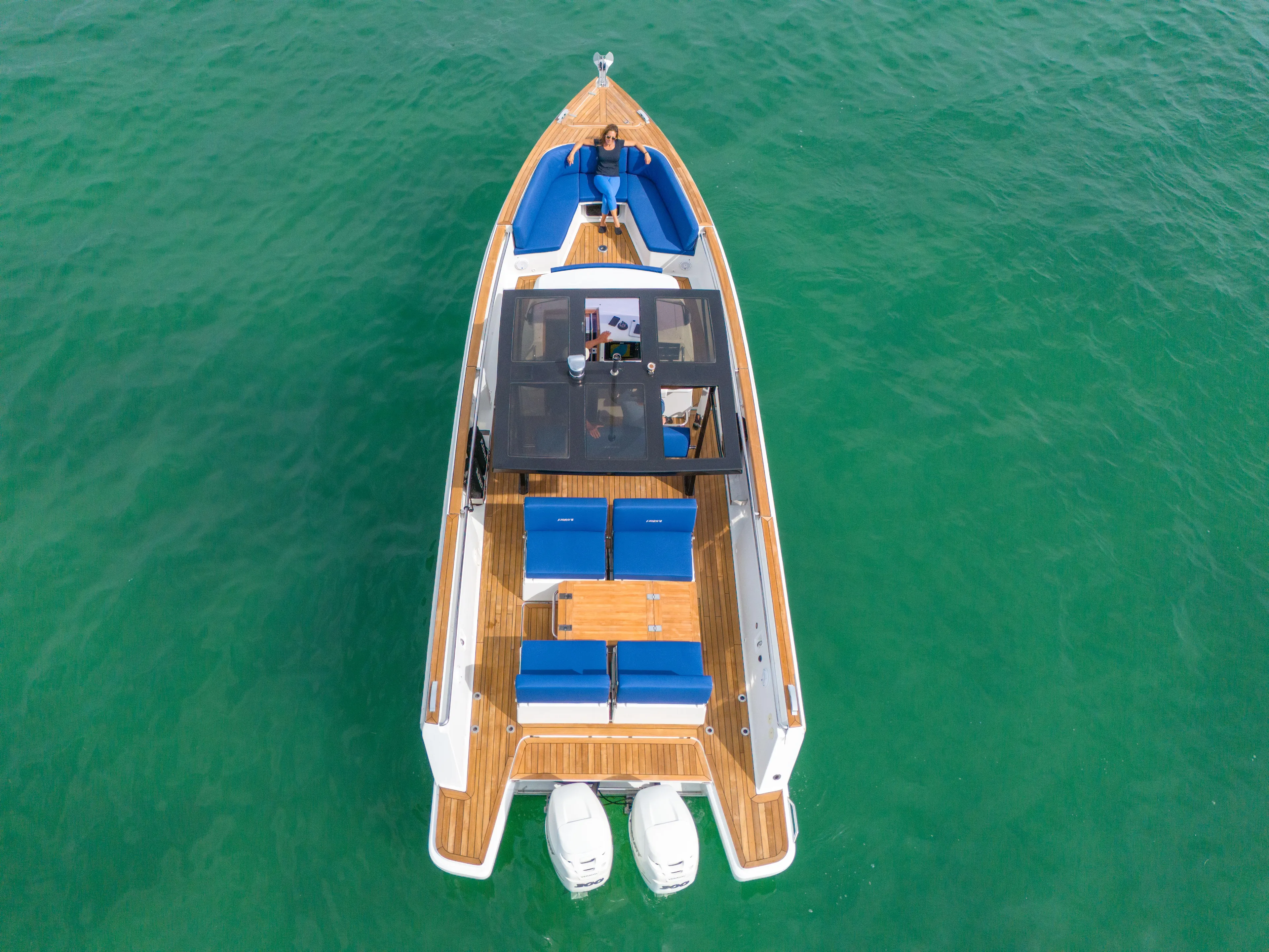 No Name Yacht Photos Pics 2019 Fjord 38 boat on clear turquoise water, aerial view.