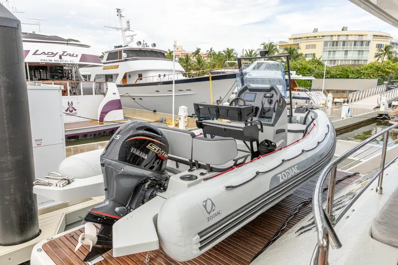Fat Cat Yacht Photos Pics 2024 Sunreef 80 Power yacht docked with Zodiac tender and Yamaha engine.