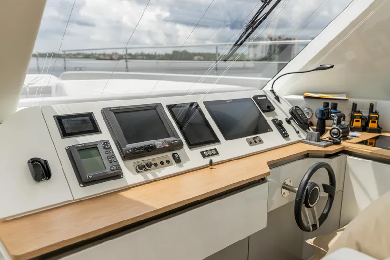 Fat Cat Yacht Photos Pics Helm station of 2024 Sunreef 80 Power yacht with advanced navigation equipment.