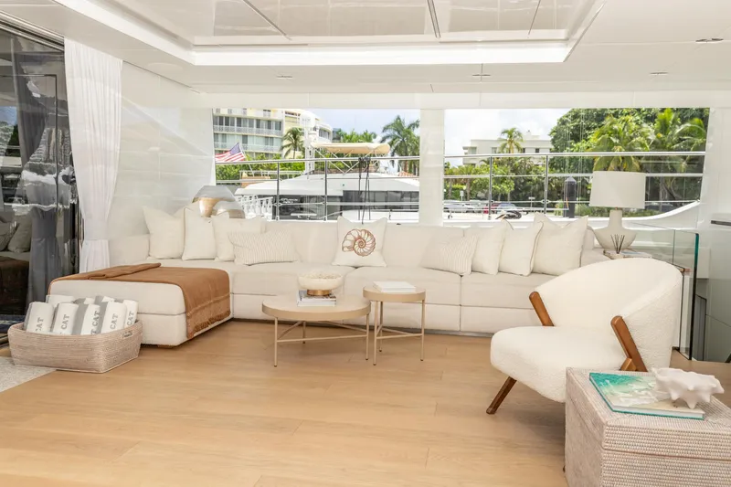 Fat Cat Yacht Photos Pics Luxurious interior of 2024 Sunreef 80 Power yacht with elegant seating and decor.