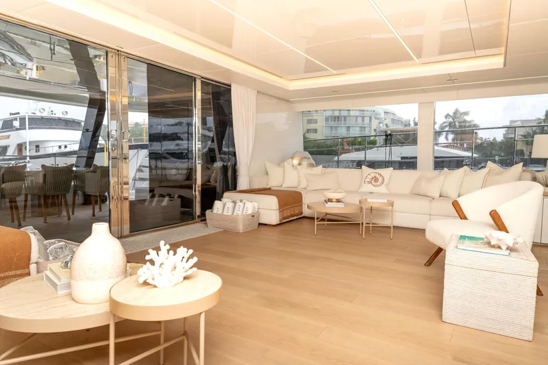 Fat Cat Yacht Photos Pics Luxurious interior of 2024 Sunreef 80 Power yacht with elegant seating and decor.