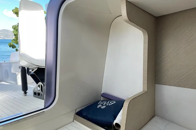  Yacht Photos Pics Interior view of 2019 IGUANA Yachts Commuter, featuring modern seating and sleek design.