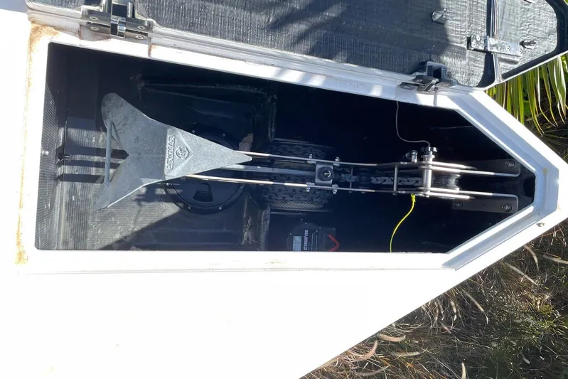  Yacht Photos Pics Open compartment of 2019 IGUANA Yachts Commuter showing mechanical components and wiring.