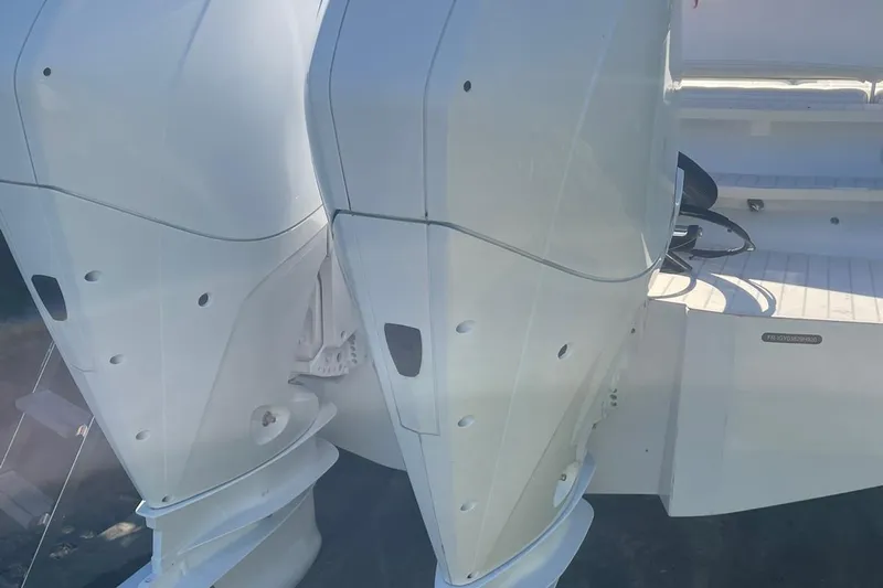  Yacht Photos Pics 2019 IGUANA Yachts Commuter with dual outboard motors, rear view.