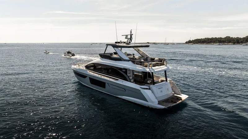  Yacht Photos Pics Luxury Azimut Fly 68 yacht cruising on open water, 2023 model.