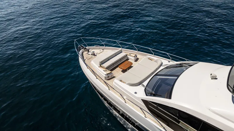 Yacht Photos Pics 2023 Azimut Fly 68 yacht cruising on open water, showcasing luxury deck design.