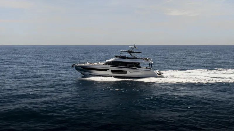  Yacht Photos Pics 2023 Azimut Fly 68 yacht cruising on open sea.