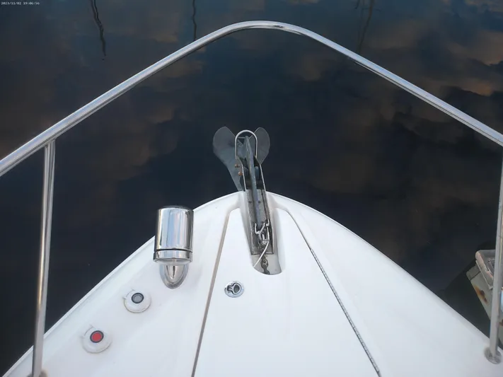 Stella Nautica Yacht Photos Pics Bow view of 2015 Sea Ray 330 Sundancer with anchor and railing.