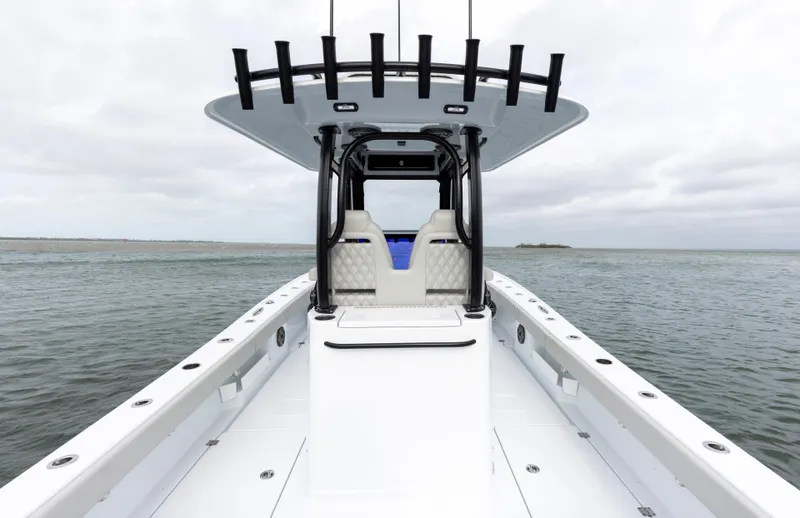  Yacht Photos Pics 2024 Freeman 28 boat on open water, featuring a sleek design and modern seating.