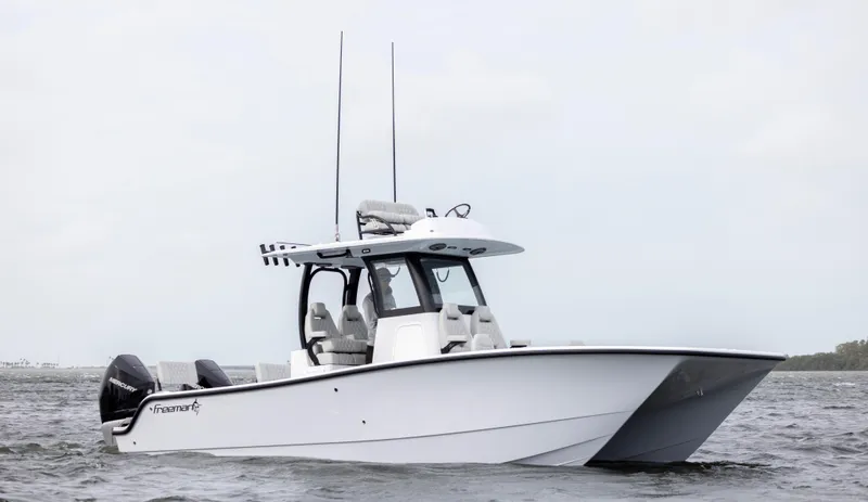  Yacht Photos Pics 2024 Freeman 28 boat on water with twin engines.