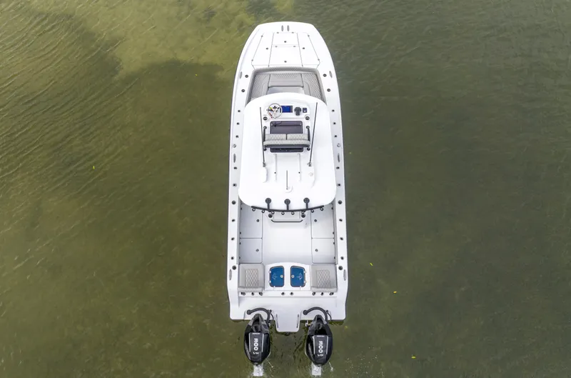  Yacht Photos Pics Aerial view of 2024 Freeman 28 boat with twin outboard motors.