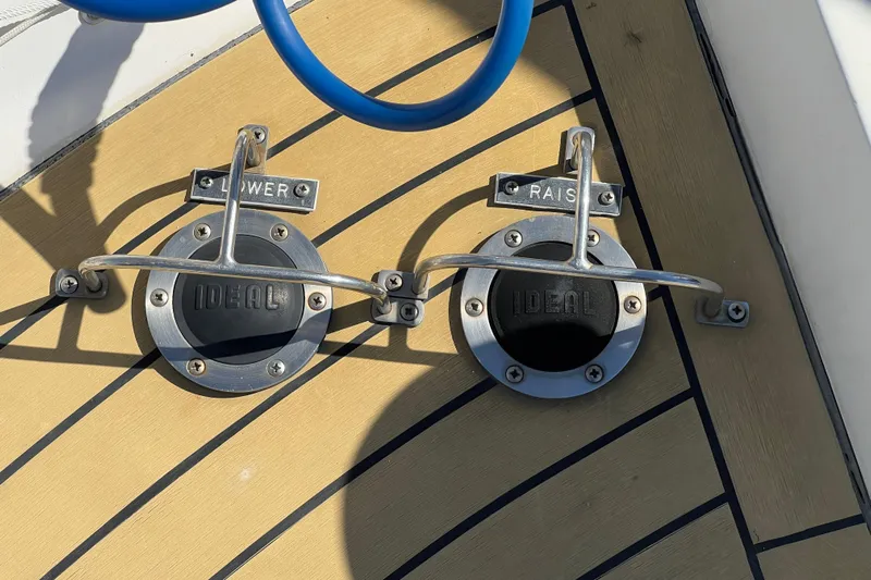 Kailani Yacht Photos Pics Foot pedals for anchor control on 1991 Viking 63 Motor Yacht deck.