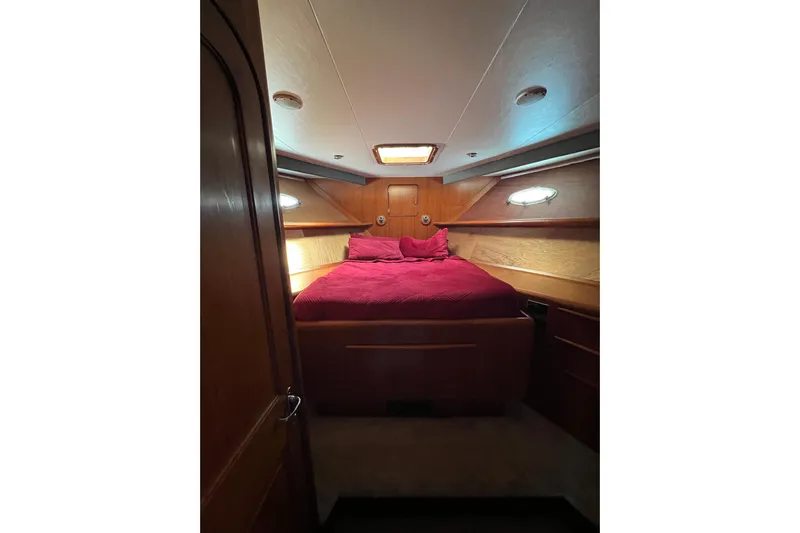 Kailani Yacht Photos Pics Cozy V-Berth forward wood accents.