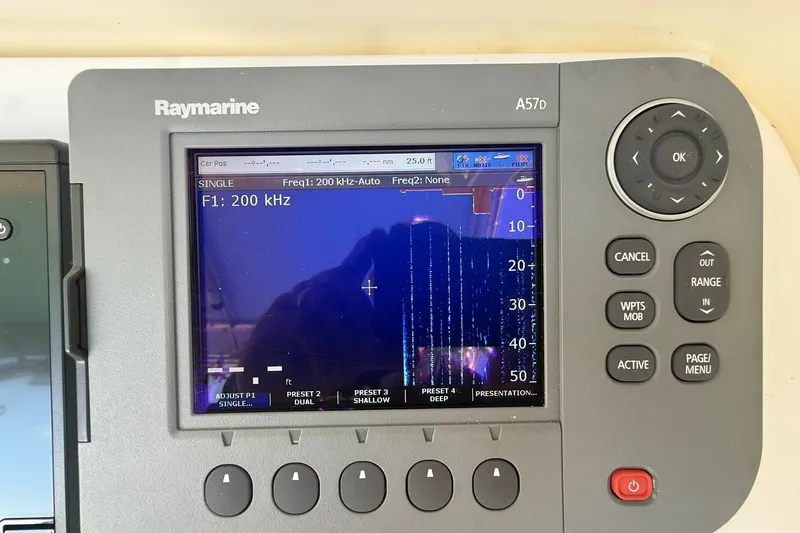 Reel Dreamz Yacht Photos Pics Raymarine A57D fishfinder display on 1998 Contender 35 Express boat, showing sonar readings.