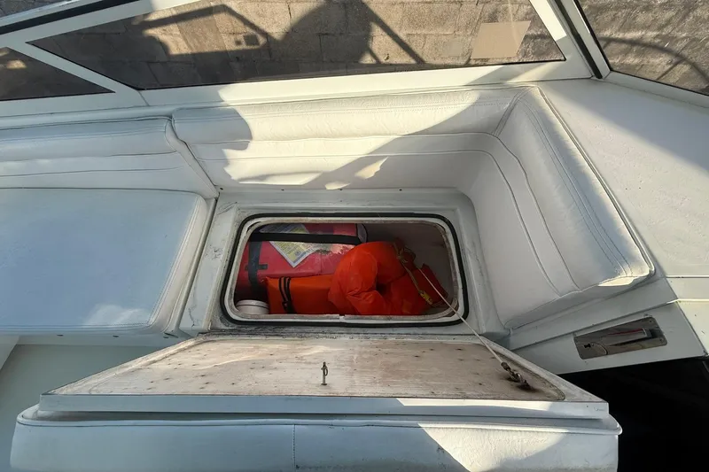 Reel Dreamz Yacht Photos Pics 1998 Contender 35 Express boat interior with open hatch and life jackets.