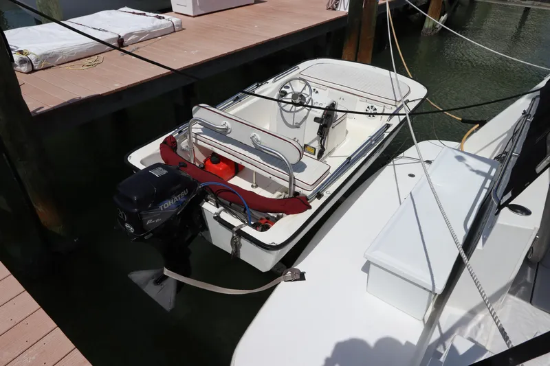 Fitz Perfectly Yacht Photos Pics 2001 Navigator 4800 CLASSIC boat docked, featuring outboard motor and steering wheel.