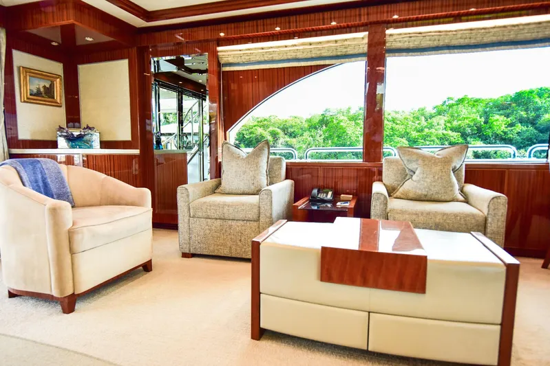 Renaissance Yacht Photos Pics Luxurious interior of 2016 Hargrave 116 RPH yacht with elegant seating and large windows.