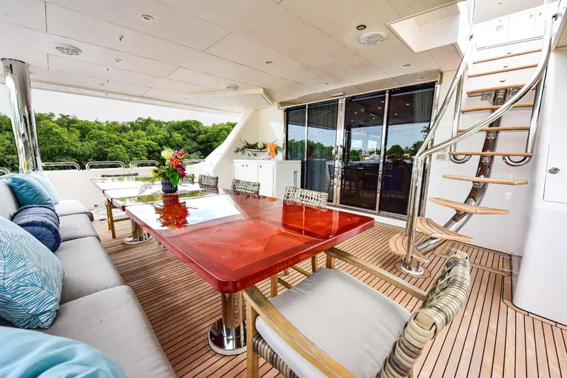 Renaissance Yacht Photos Pics Luxurious 2016 Hargrave 116 RPH yacht deck with elegant seating and spiral staircase.