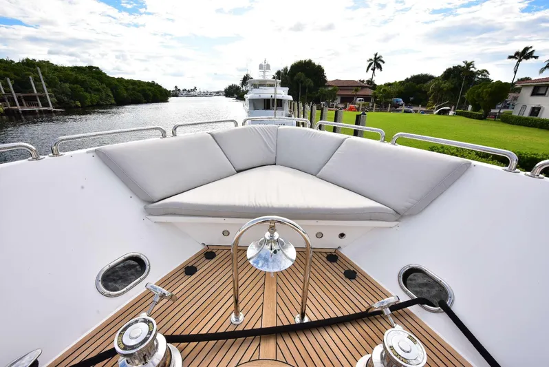 Renaissance Yacht Photos Pics Bow seating area on 2016 Hargrave 116 RPH yacht, featuring plush cushions and teak decking.