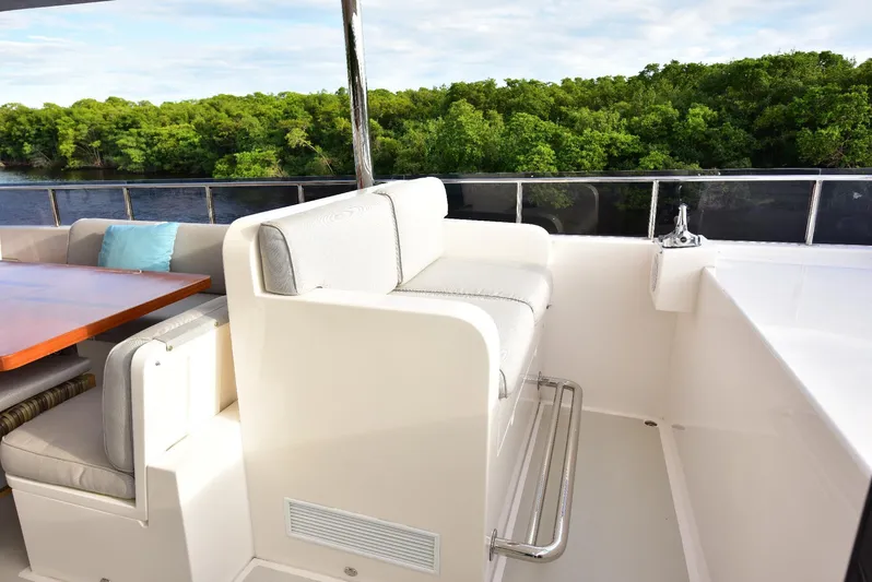 Renaissance Yacht Photos Pics Luxurious seating area on 2016 Hargrave 116 RPH yacht with scenic water view.