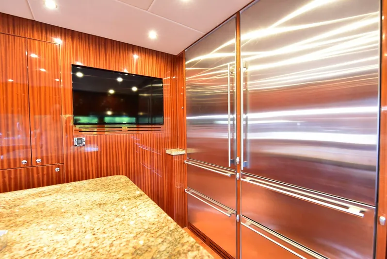 Renaissance Yacht Photos Pics Luxurious kitchen interior of 2016 Hargrave 116 RPH yacht with stainless steel appliances.