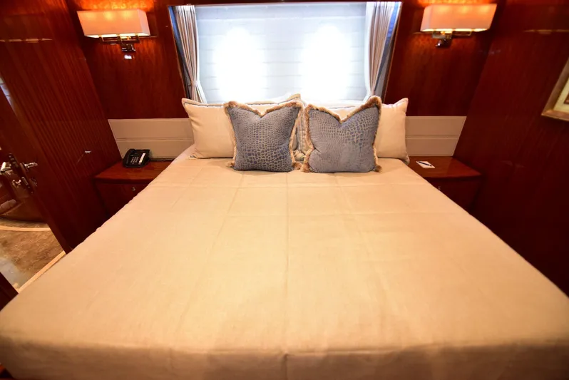 Renaissance Yacht Photos Pics Luxurious bedroom interior on 2016 Hargrave 116 RPH yacht with elegant bedding and lighting.