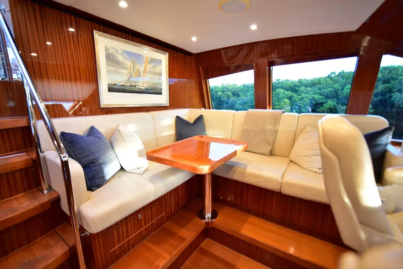 Renaissance Yacht Photos Pics Luxurious interior of 2016 Hargrave 116 RPH yacht with elegant seating and wooden finishes.