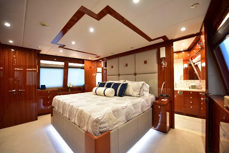 Renaissance Yacht Photos Pics Luxurious bedroom interior of 2016 Hargrave 116 RPH yacht with elegant wood finishes.