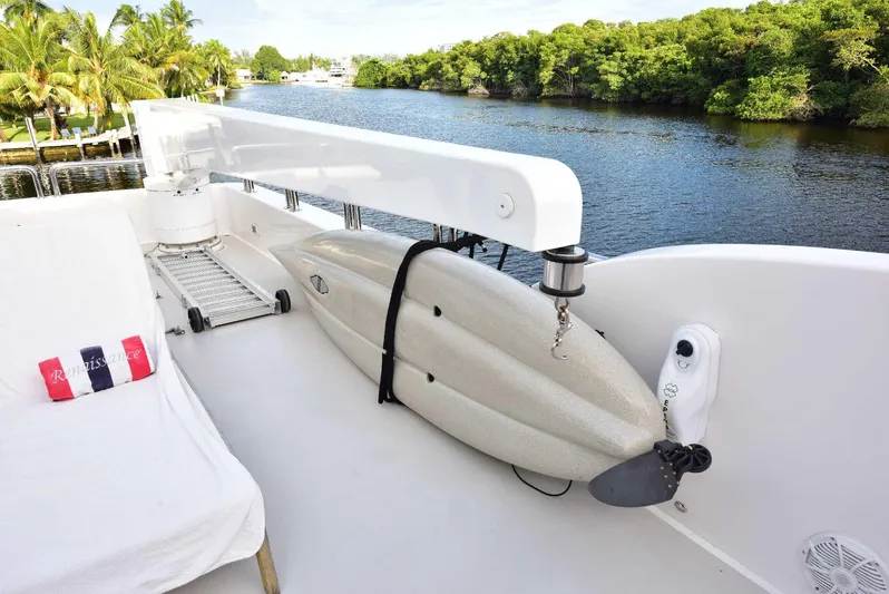 Renaissance Yacht Photos Pics 2016 Hargrave 116 RPH yacht deck with surfboard and scenic river view.
