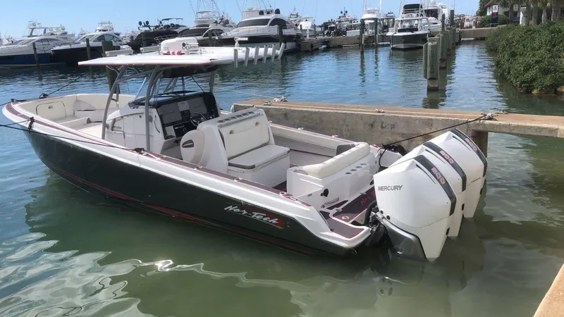  Yacht Photos Pics 2015 Nor-Tech 340 Sport boat docked with twin Mercury engines.