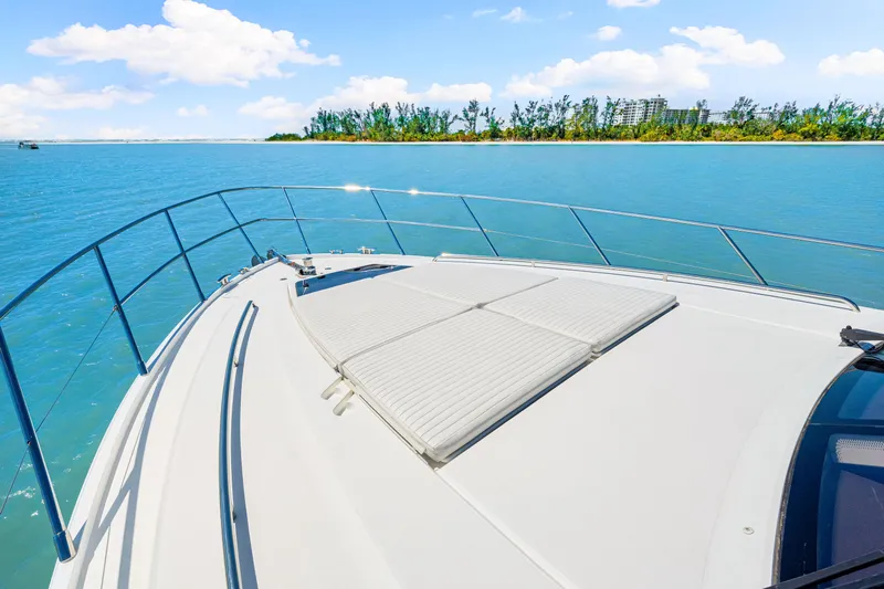 Fuelish Pleasure II Yacht Photos Pics Luxury yacht Princess 56, 2017 model, cruising on serene blue waters.