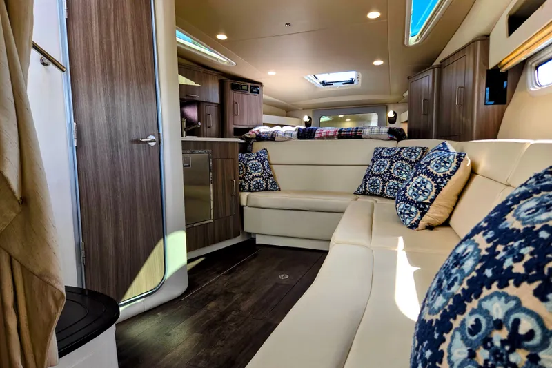 Willowbender Yacht Photos Pics Luxurious interior of 2019 Regal 35 Sport Coupe with elegant seating and stylish decor.