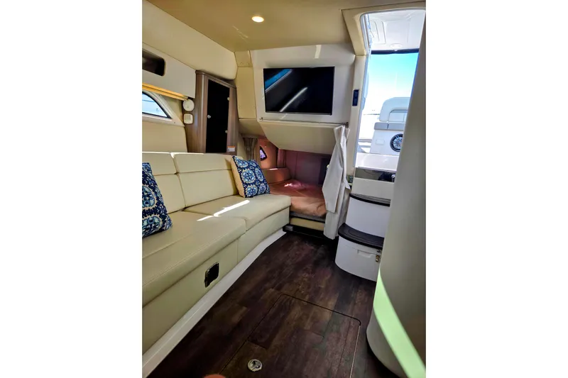 Willowbender Yacht Photos Pics Luxurious interior of 2019 Regal 35 Sport Coupe with plush seating and modern amenities.