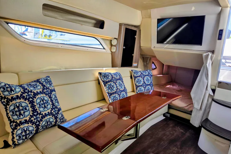 Willowbender Yacht Photos Pics Luxurious interior of 2019 Regal 35 Sport Coupe with elegant seating and decor.