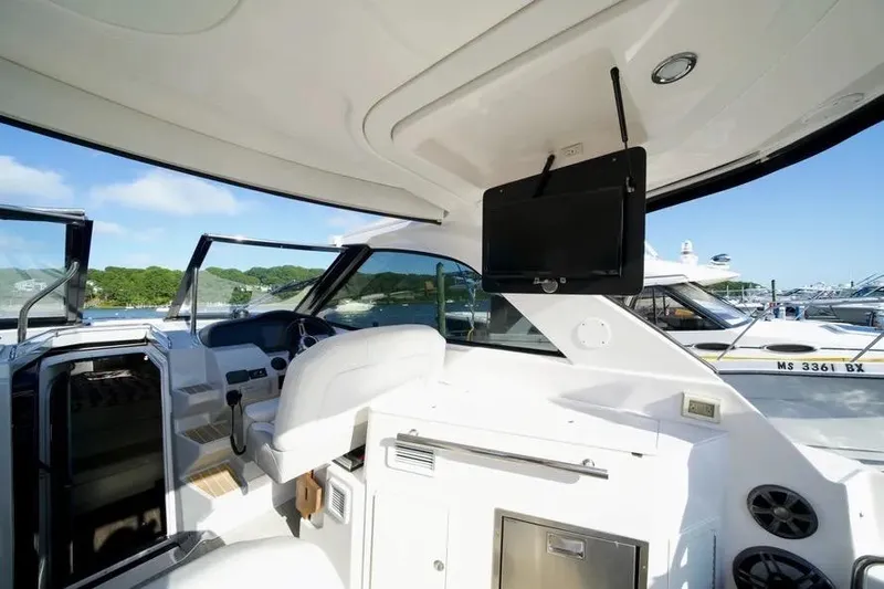 Willowbender Yacht Photos Pics Interior of 2019 Regal 35 Sport Coupe yacht with modern amenities and scenic marina view.